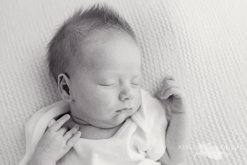 Natural light newborn baby photography in black and white Niagara Ontario Canada
