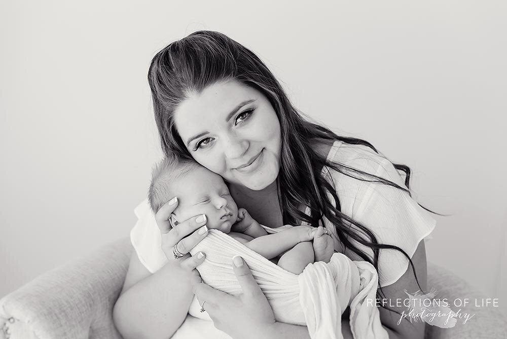 Newborn baby boy in mamas arms black and white so beautiful Grimsby Ontario