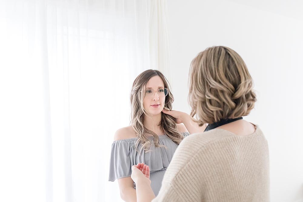 Fixing client's hair during a pregnancy client in Niagara Ontario (Copy)