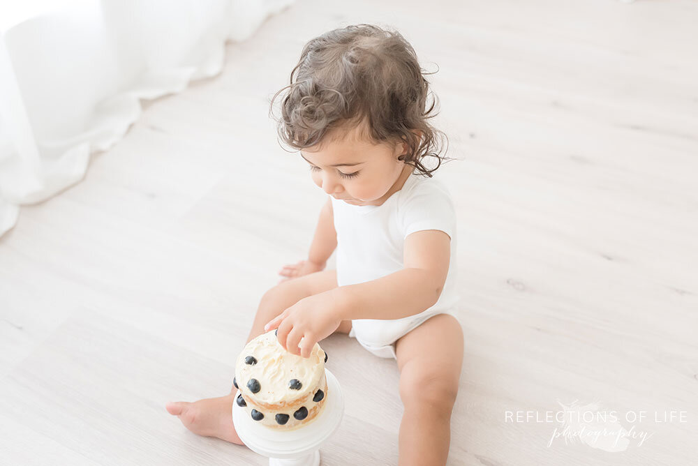 Little boy blueberry vanilla cake smash Niagara Region baby photographer