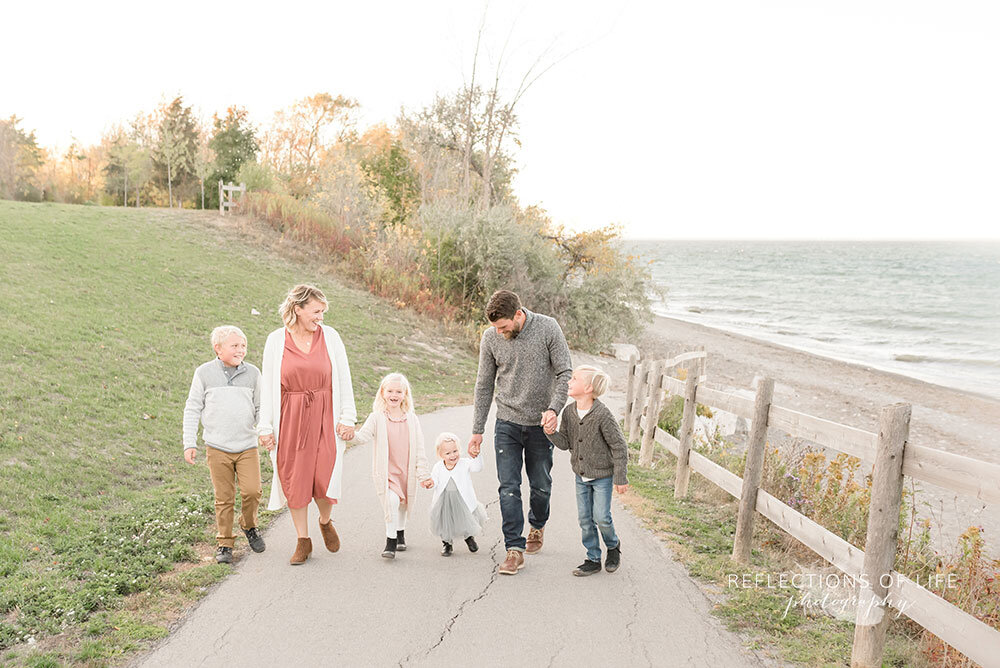 Family walking down the path at Casablanca Beach in Grimsby Ontario