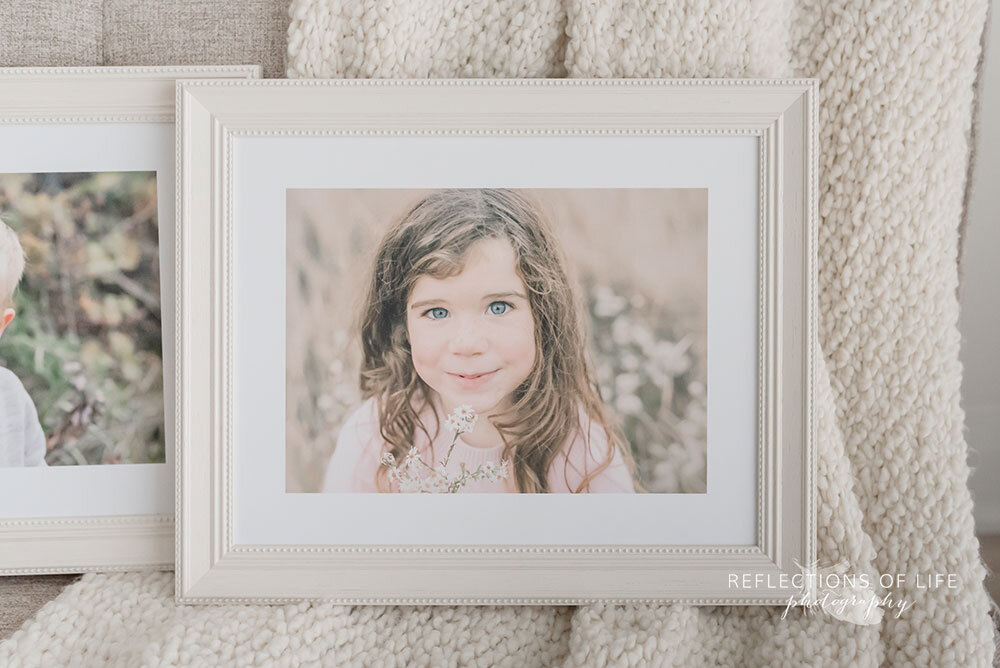 Custom framed photographs of little girl with long brown hair Niagara Region child photographer