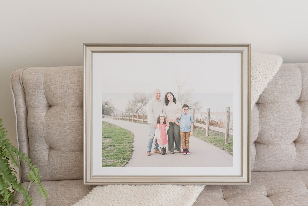Professional Family Photographer Deep Matte Portraits in metallic silver frame