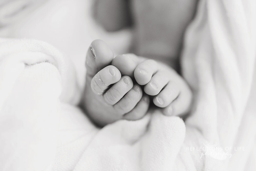 Super cute image of newborn baby toes in black and white Grimsby Newborn Photographer