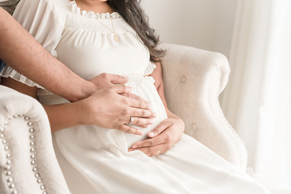 Hands on baby bump maternity photo session niagara