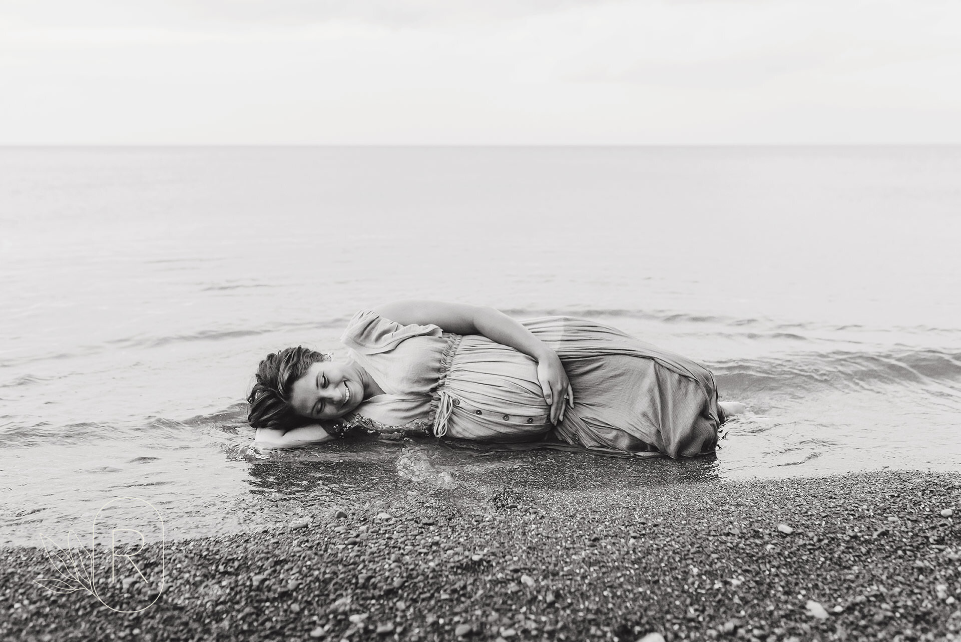 mother lying down in water