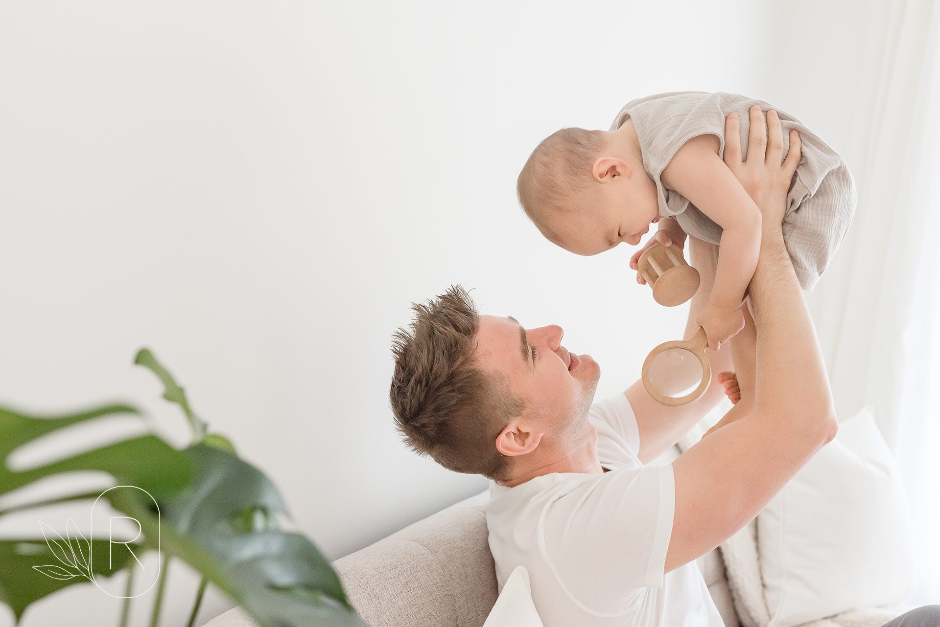 baby-smiling-dad-silly-moments-family-photographer-niagara-ontario.jpg