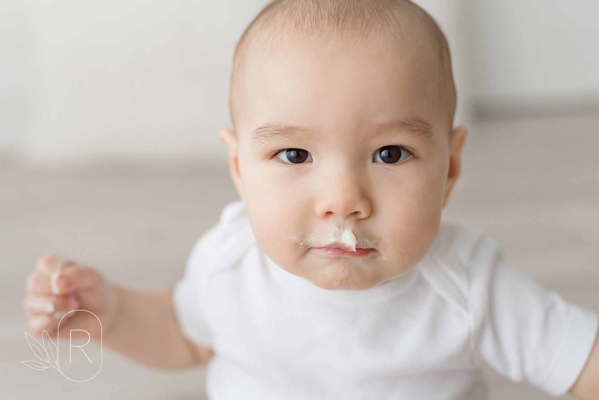 celebrate-baby-first-birthday-cake-smash-icing-niagara-ontario-photographer.jpg