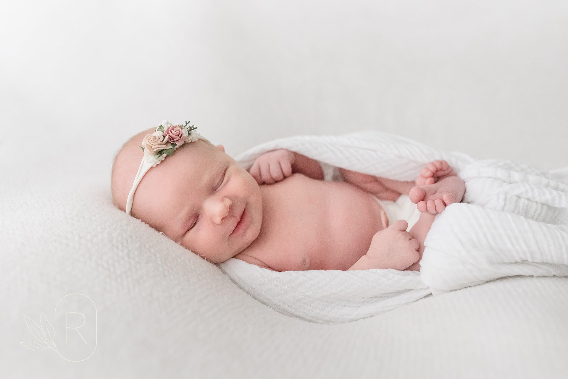 newborn-baby-snuggled-smiles-family-photography-niagara-ontario.jpg