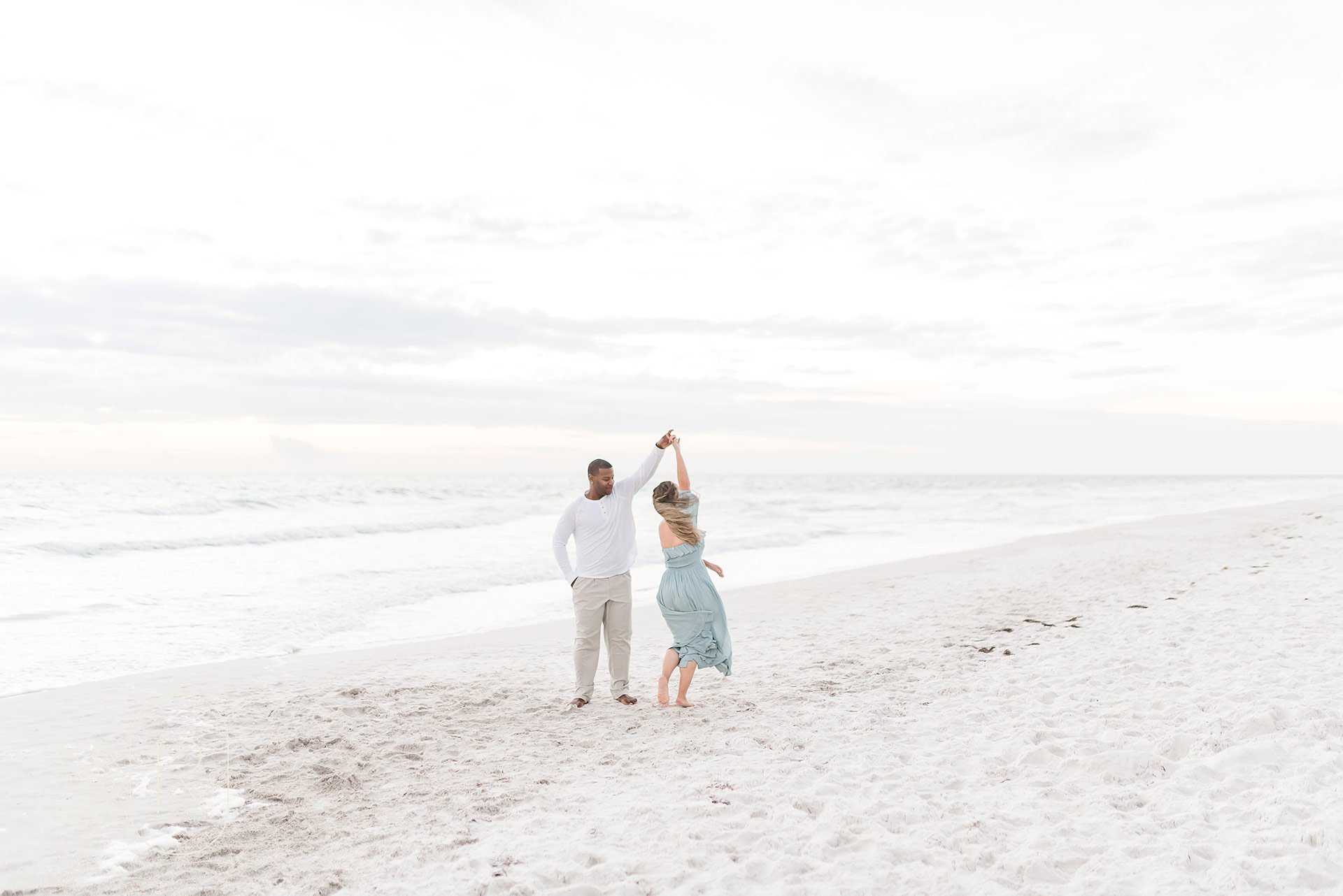 mom-dad-dancing-florida-beach-sunset-florida-photography-workshop-family-session-behind-the-scenes-photography-Reflections-niagara-ontario.jpeg