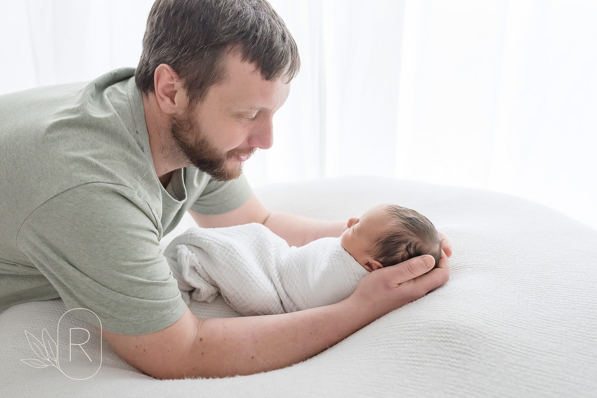 dad-and-newborn-connecting-reflections-family-photography-niagara-ontario.jpeg