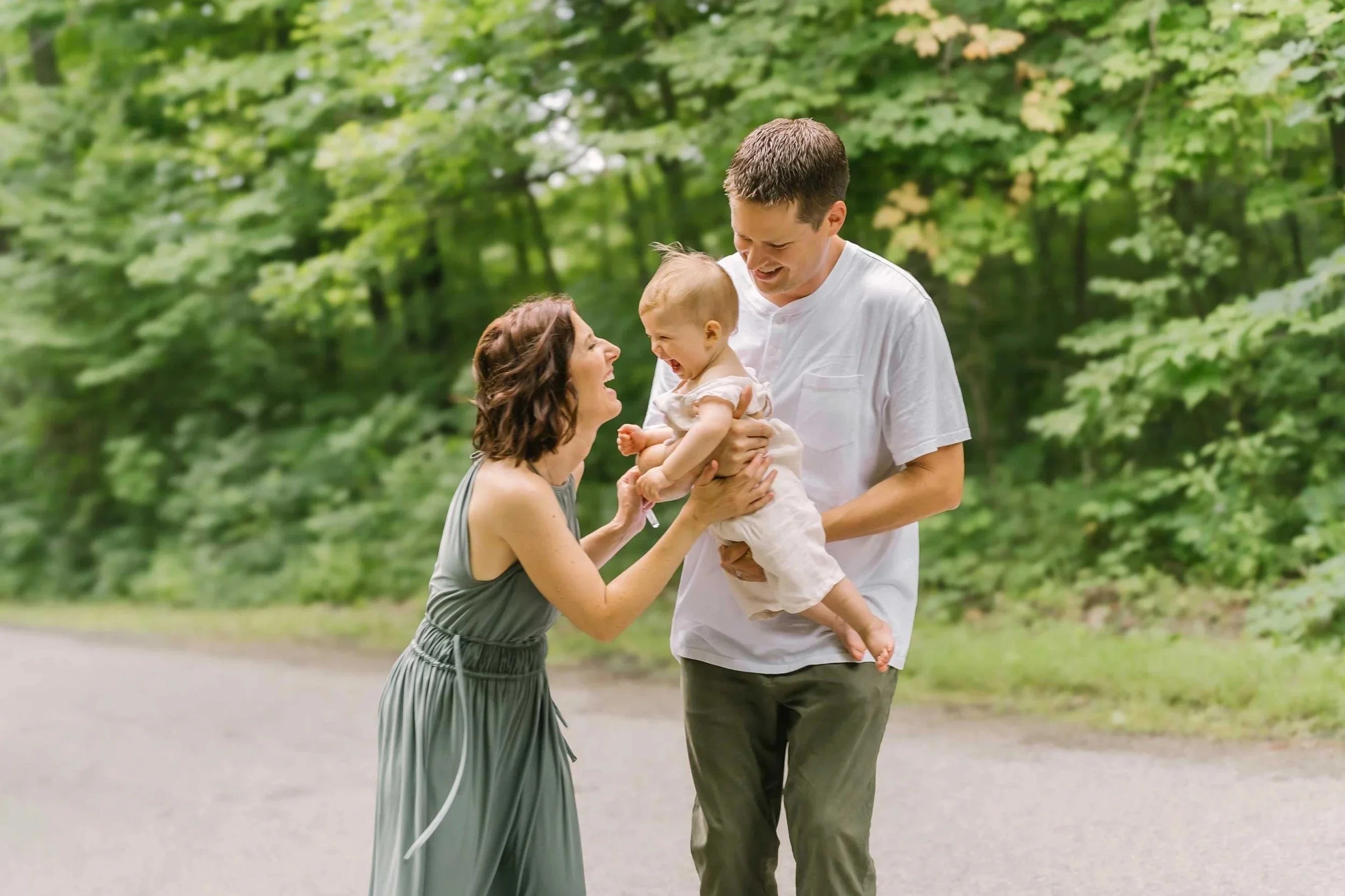 Family playing together captured by niagara family photographer near me