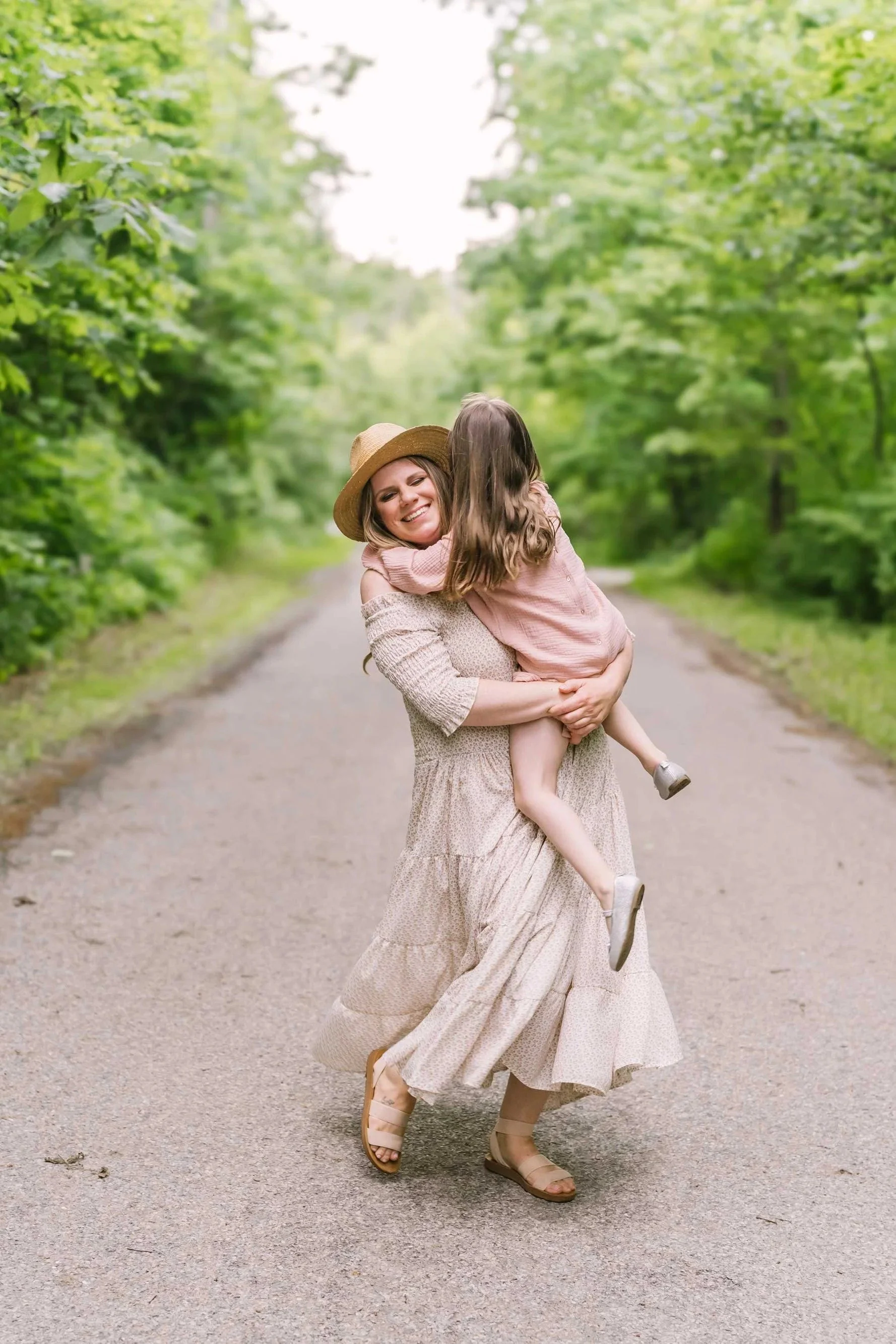 Mom and daughter embracing, taken by family photographer in Niagara, Karen Byker from Reflections