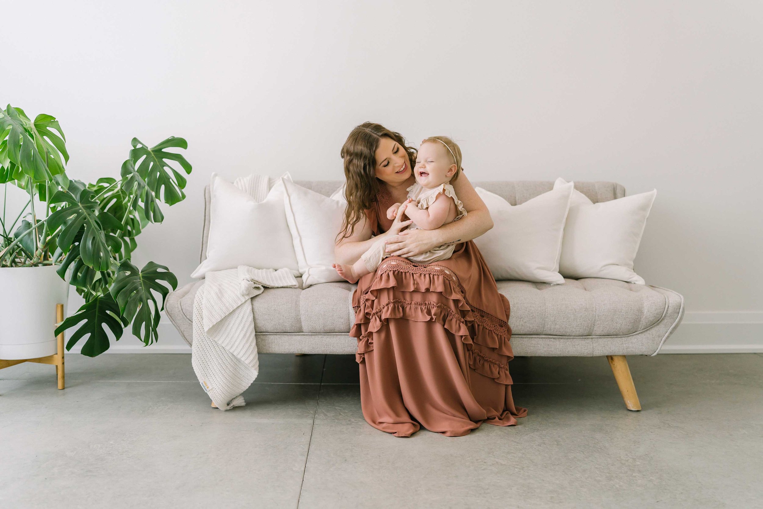 Hamilton Baby Photography little girl laughing in neutrals with mom.jpg