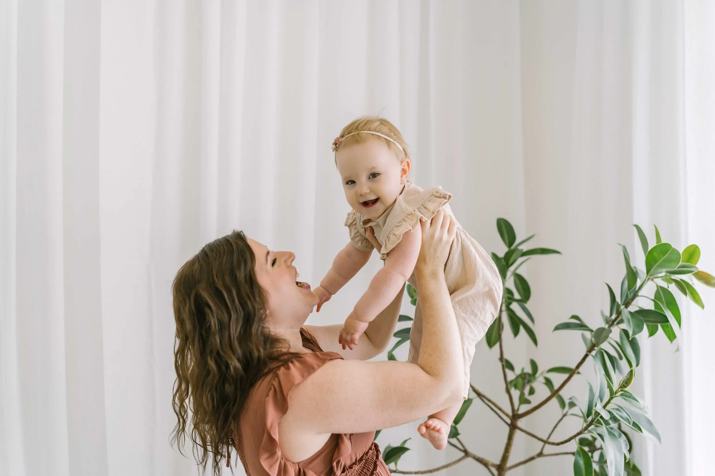 Mom and daughter posing for newborn photographer in niagara, Karen Byker
