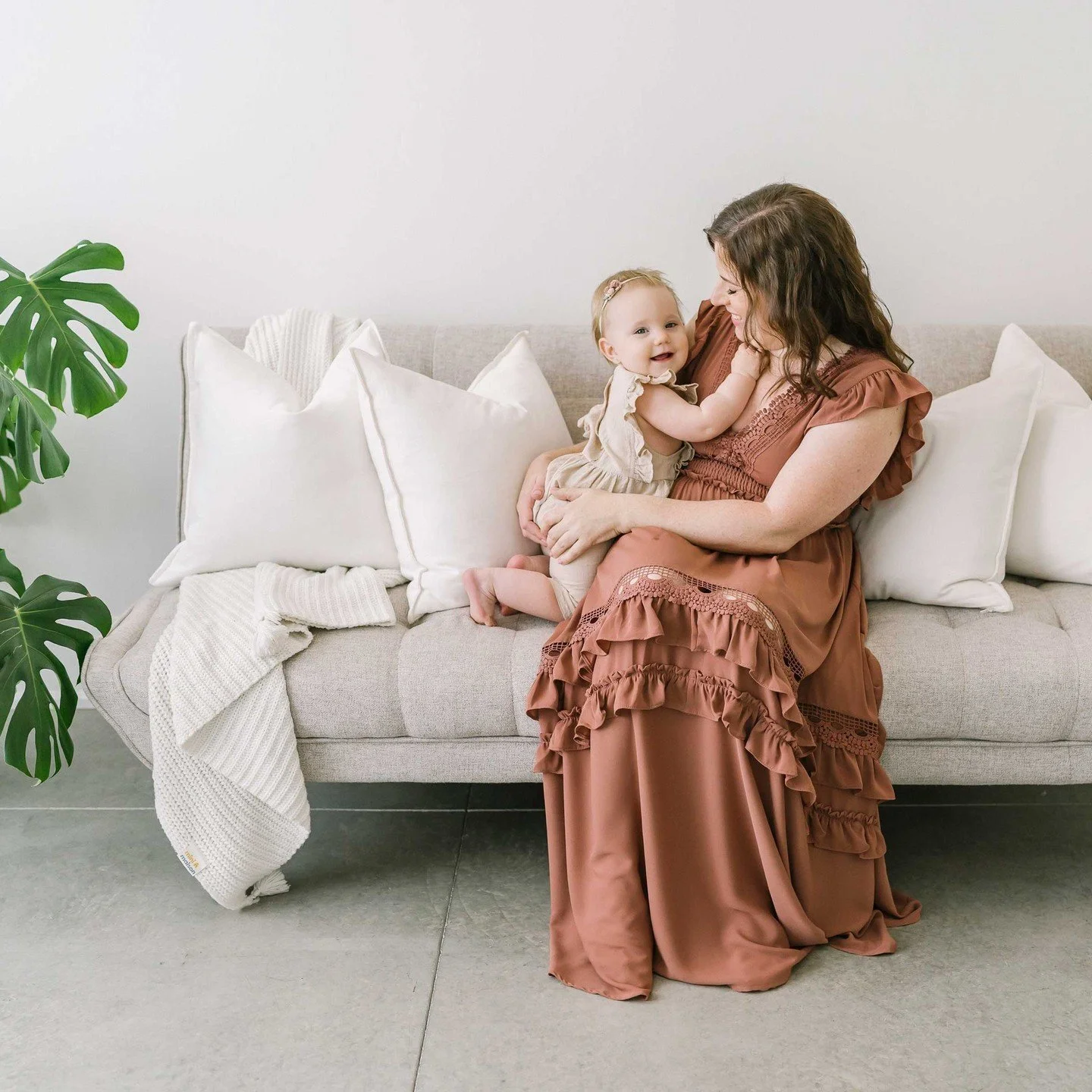 The photos you'll be most glad you have aren't the perfectly posed ones. They're these.⁠
⁠
You, holding your baby. Both of you laughing at something only you two understand. The little face that lights up the second they see yours.⁠
⁠
This first year