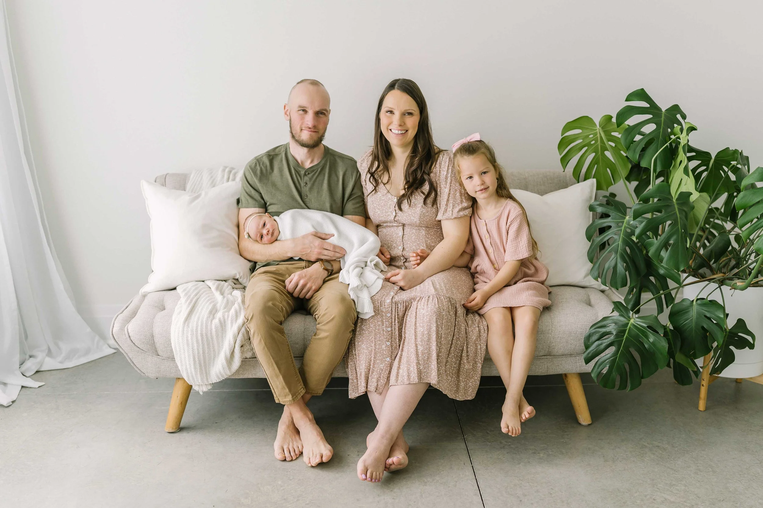 Family portrait with newborn baby in Grimsby studio