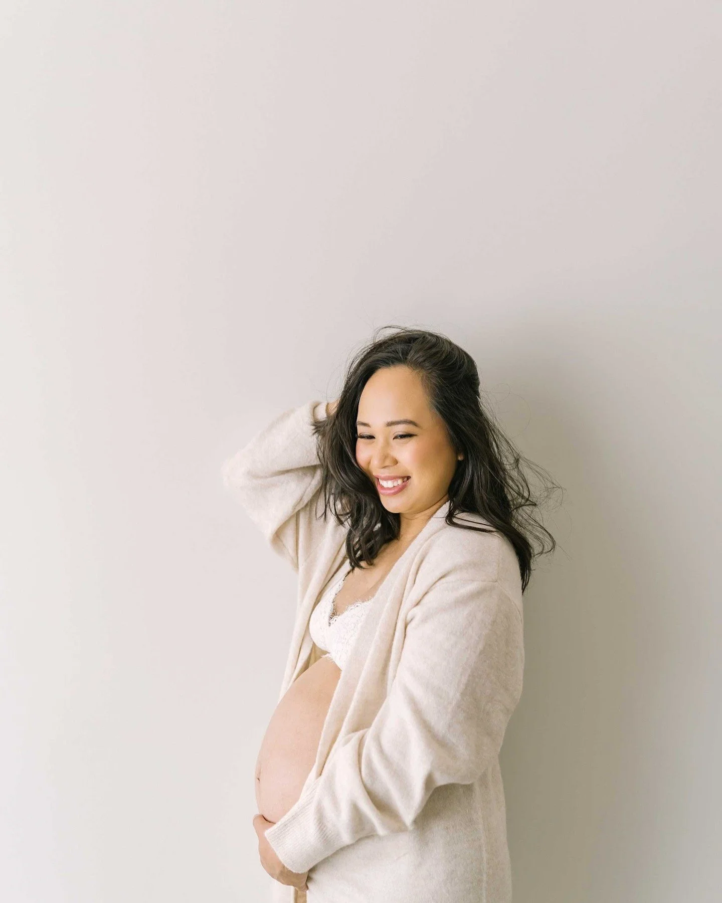 Nobody tells you maternity photos can actually be fun.⁠
⁠
No forced smiles. Just good music, someone doing your hair &amp; makeup, and a photographer who knows how to get you laughing instead of posing.⁠
⁠
This is what a Reflections session feels lik