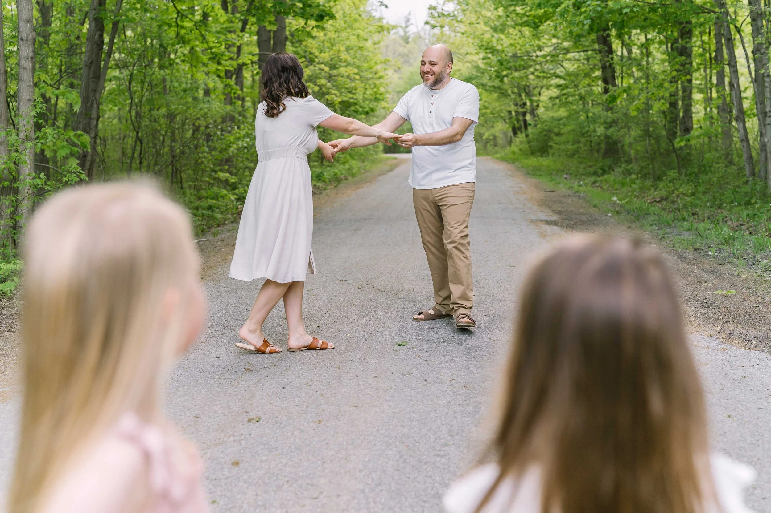 Natural family photography on a wooded trail near Grimsby