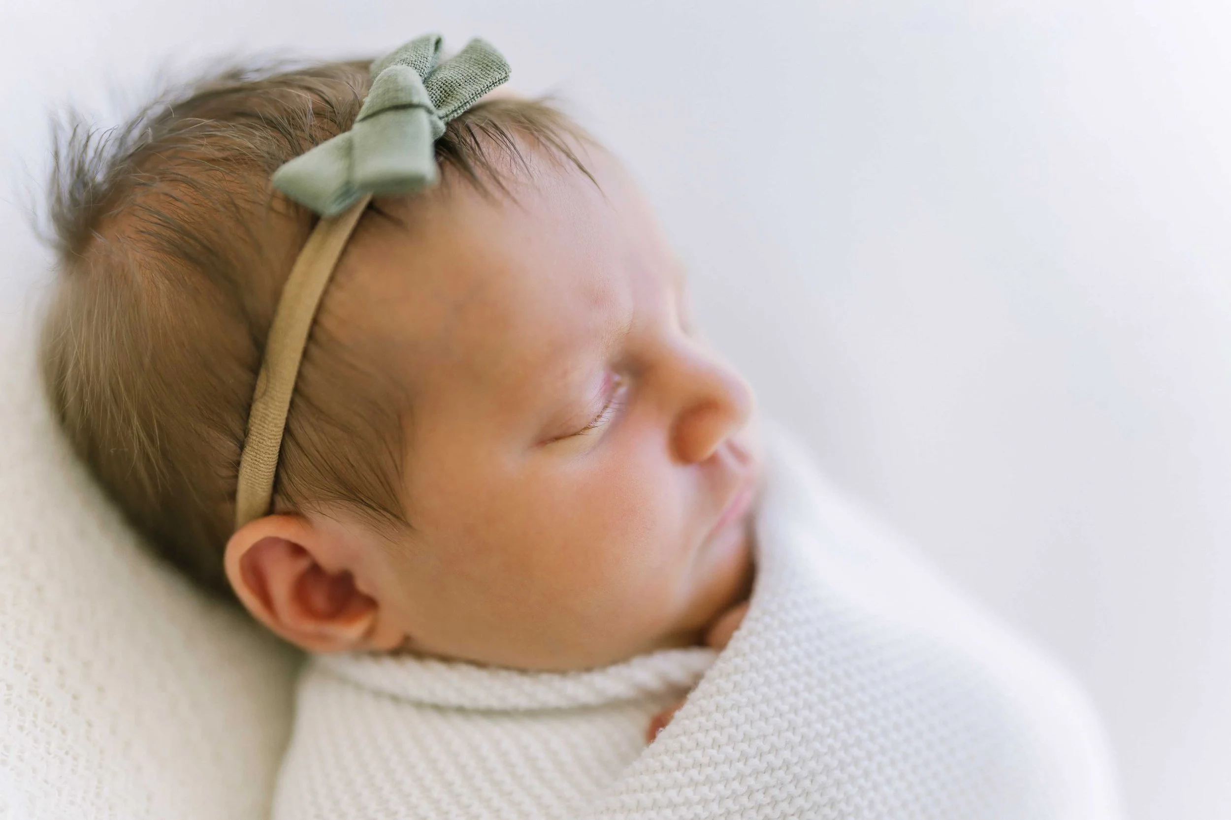 Sleepy Smiles and Soft Bows: A Newborn Session in Grimsby
