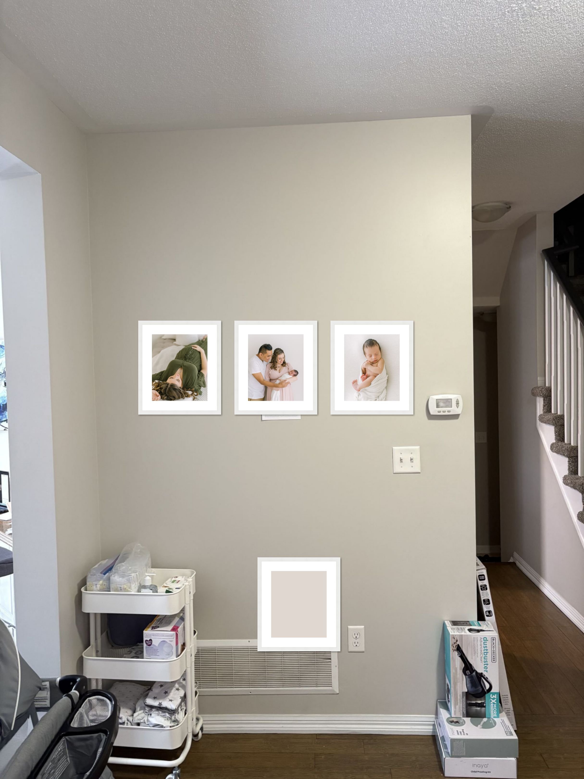 Design mockup of framed portraits on wall for heirloom family photo albums Ontario project