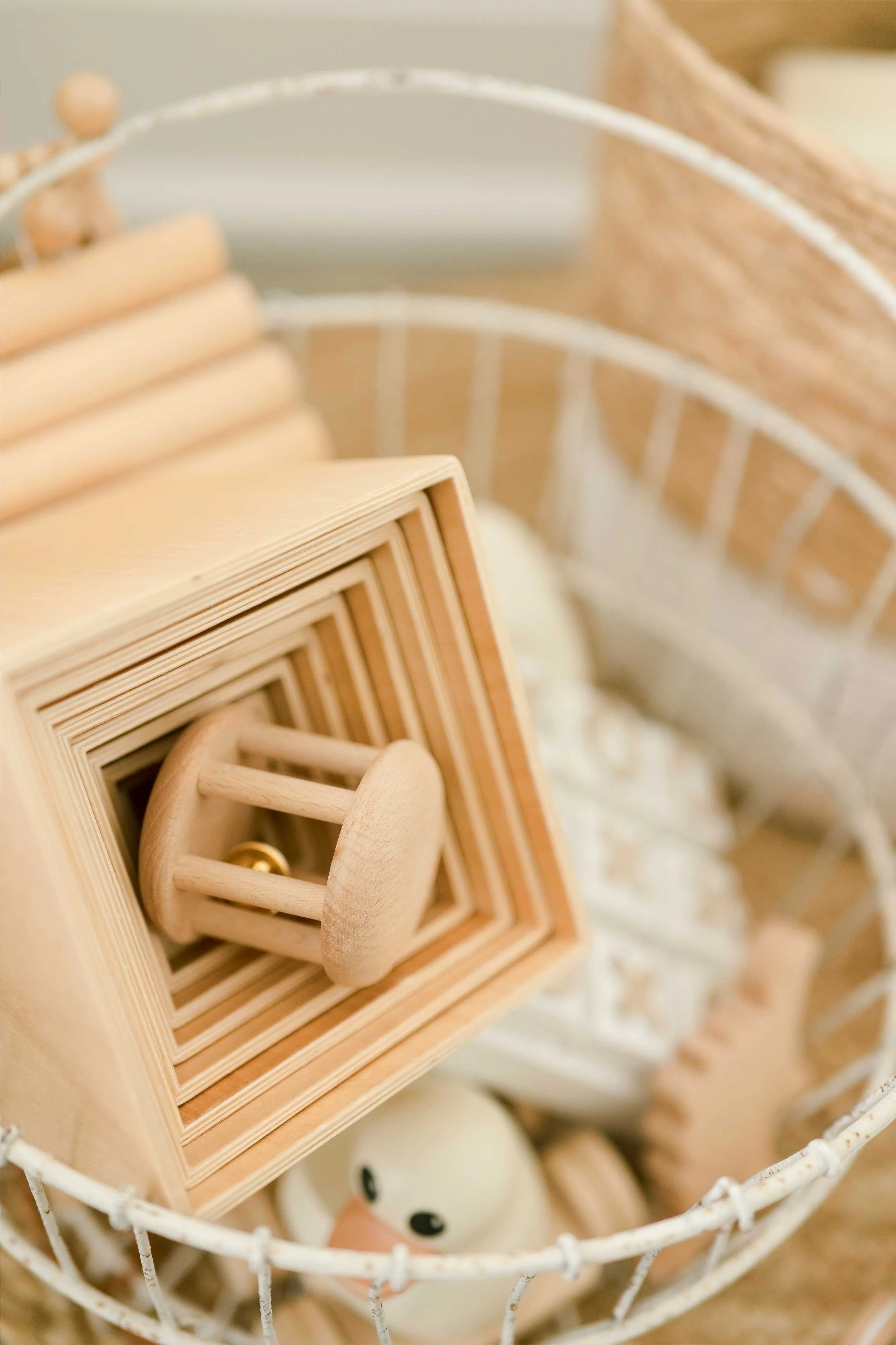 Wooden baby rattle and props used by Grimsby newborn photographer for sessions