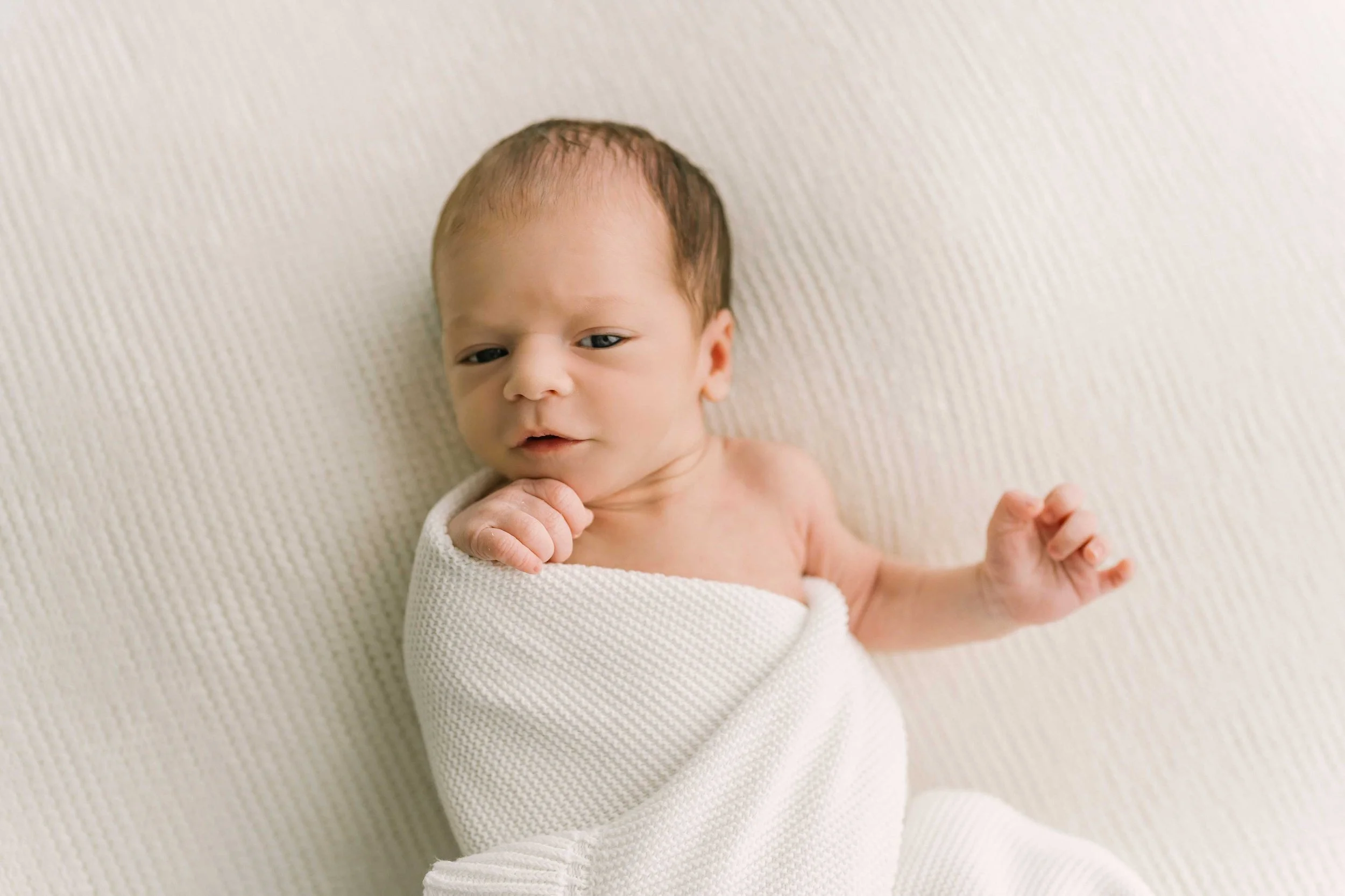 Chong newborn baby awake during a Grimsby newborn photography session