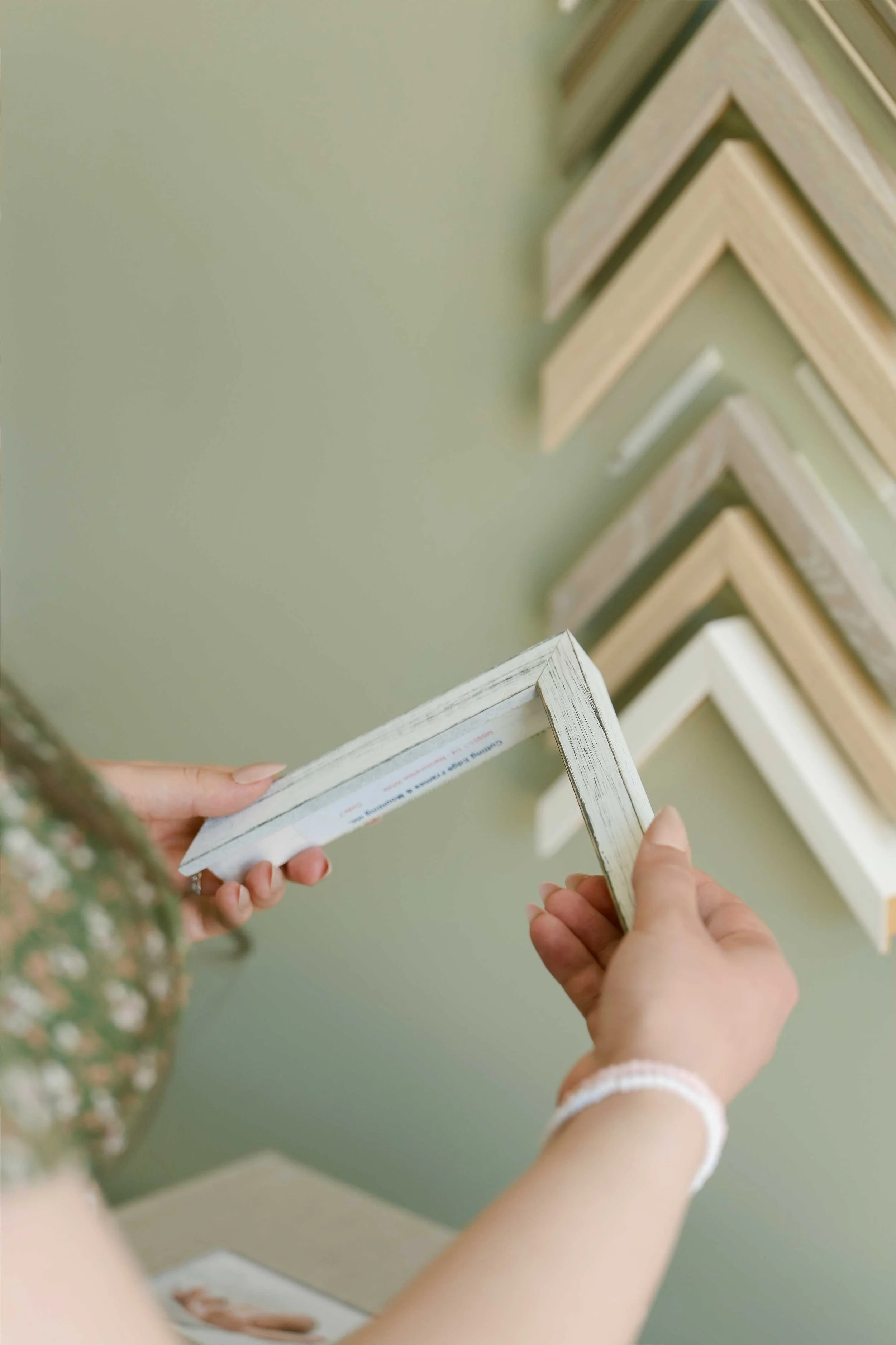 Choosing frame finish and fabric options for family photography artwork in Hamilton