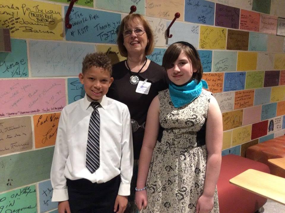 Joyce Thompson with her granddaughter, Rachel, and a fellow classmate at Harambee Elementary.