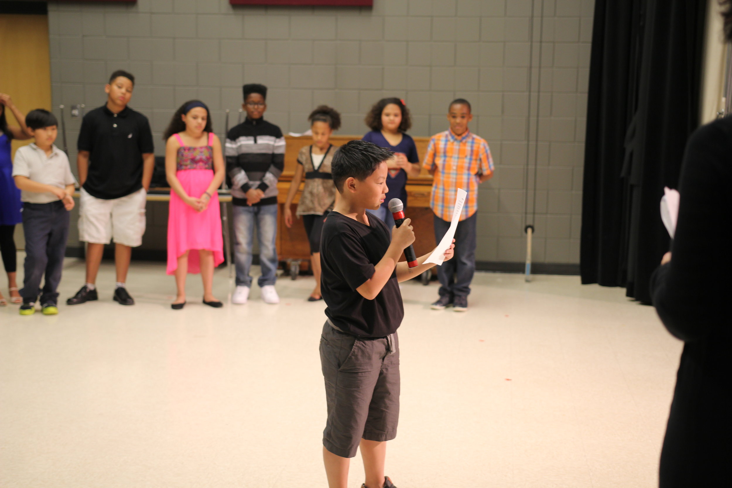 5th Grader at harambee Elementary school's culminating Event