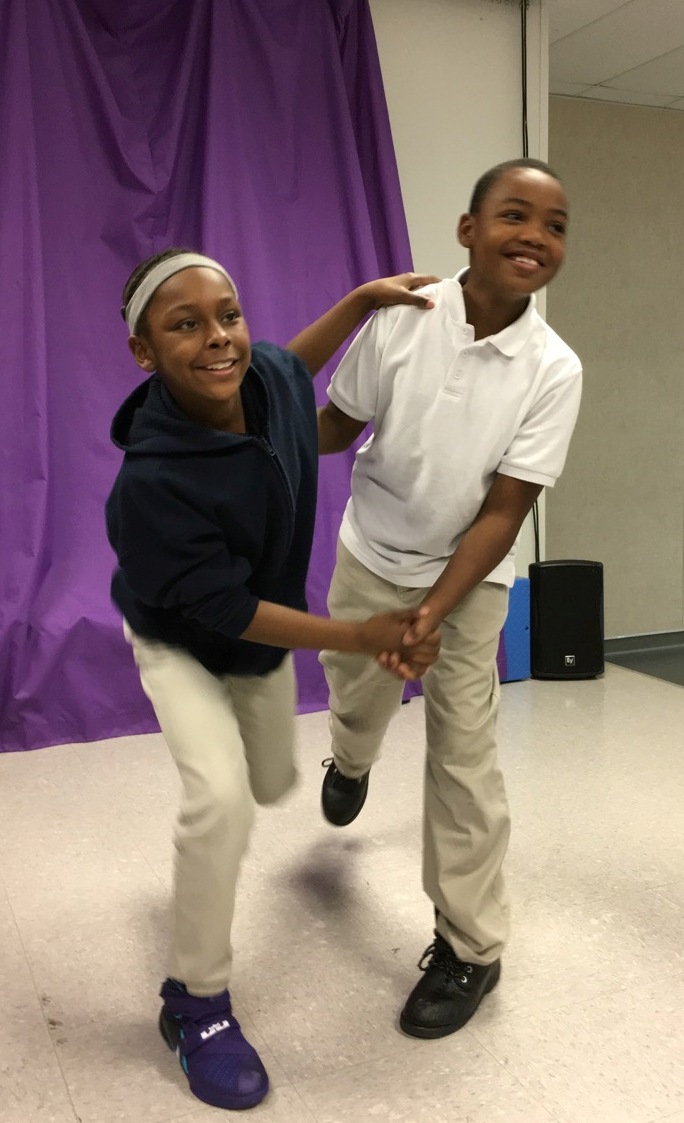 Students at Benjamin Mays I.B. World School happily dancing