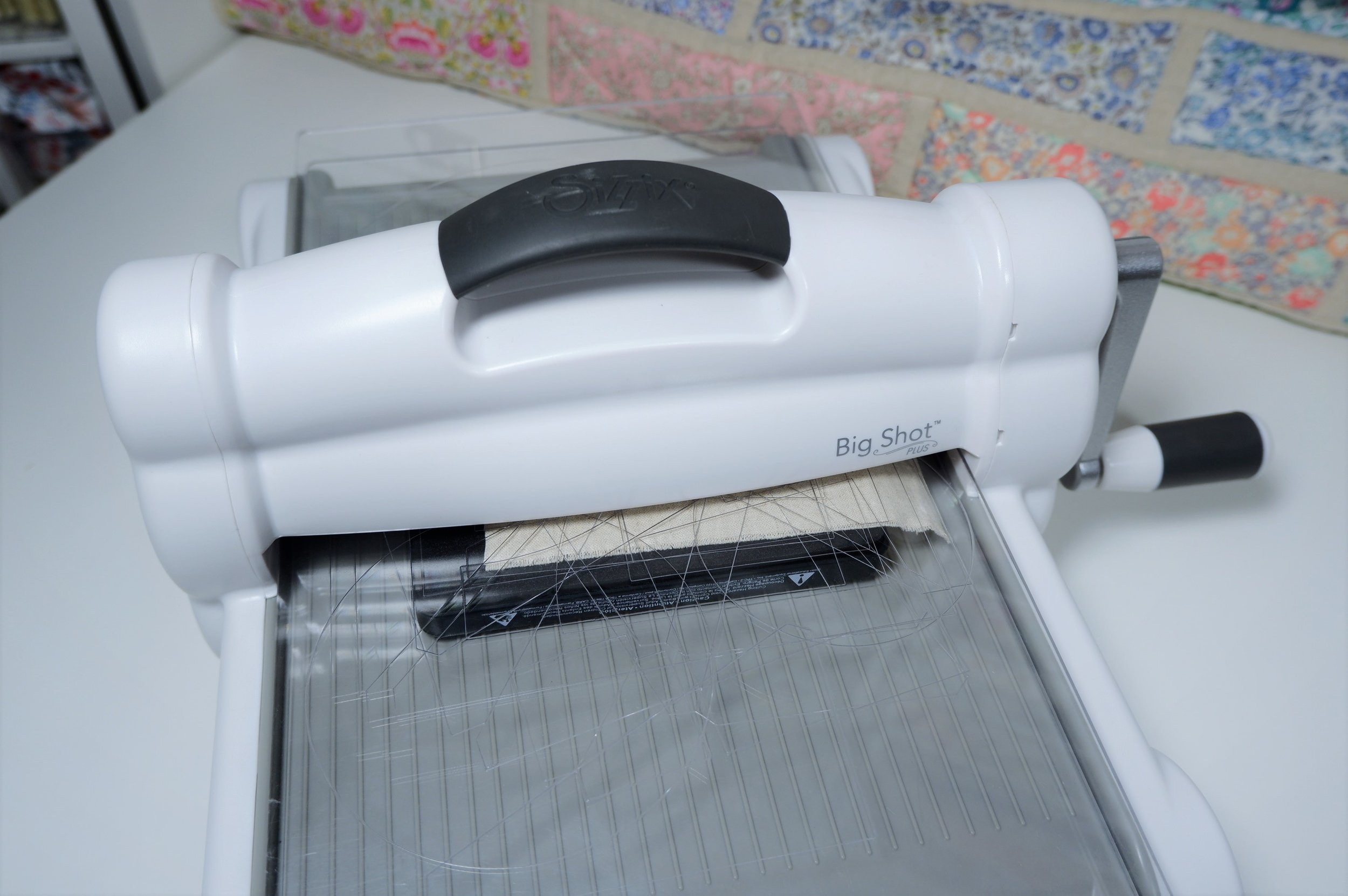 Roll your Sizzix sandwich through the machine.