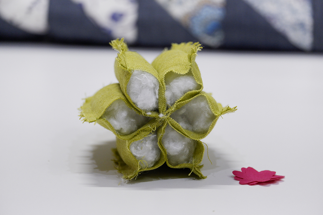 Now it’s time to stuff each of the six little pockets full of stuffing. Make sure to push some all the way to the top to ensure a nice plump cactus.