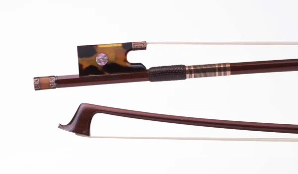$3800 Round pernambuco stick, with a French wrap Engraved gold mounted faux tortoise shell frog, with an engraved gold button Peccatte style