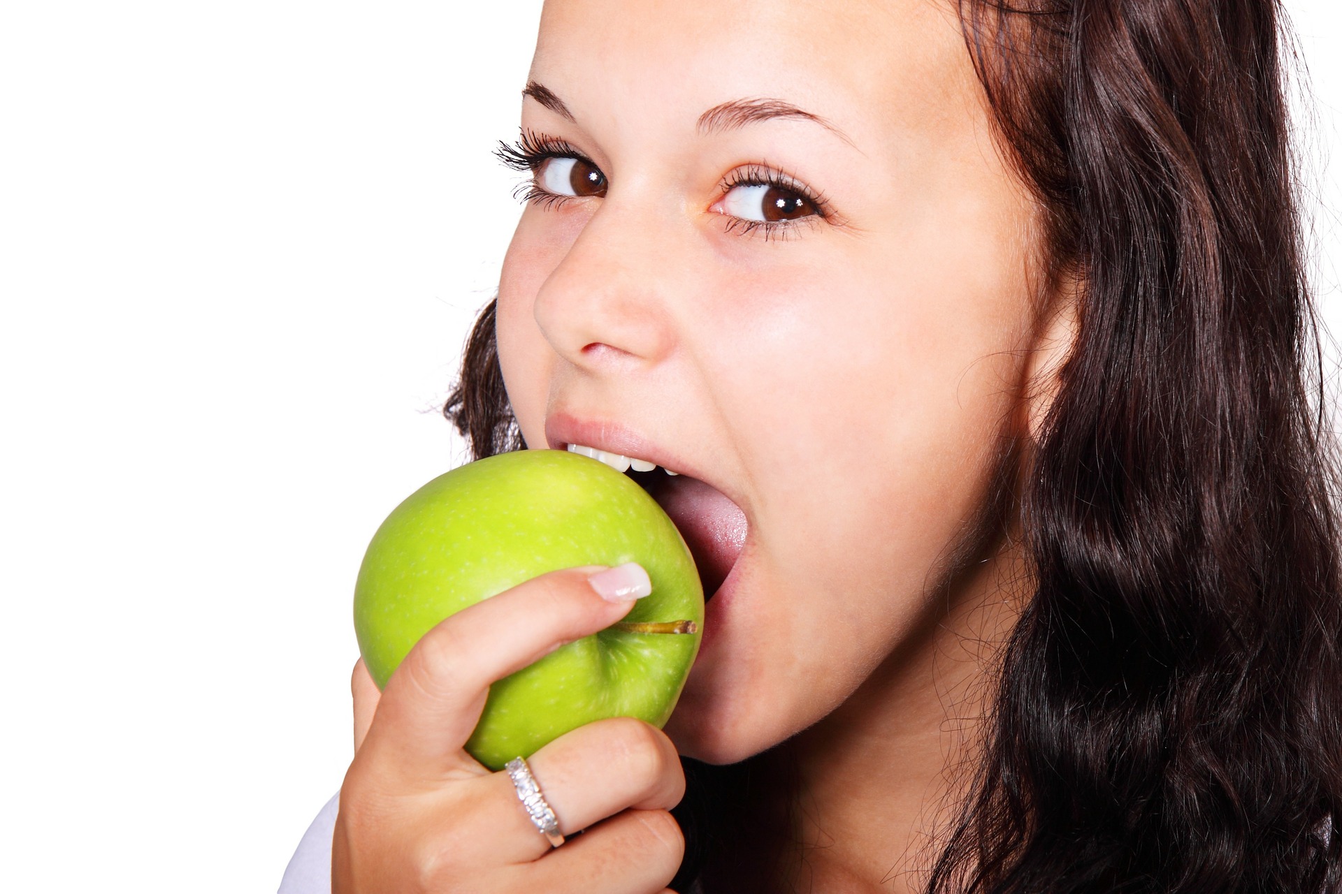picture of a girl eating an apple
