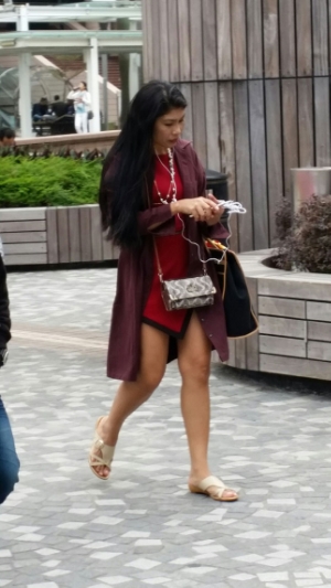 A Chinese-inspired dress with an overcoat show the blend of Eastern and Western style