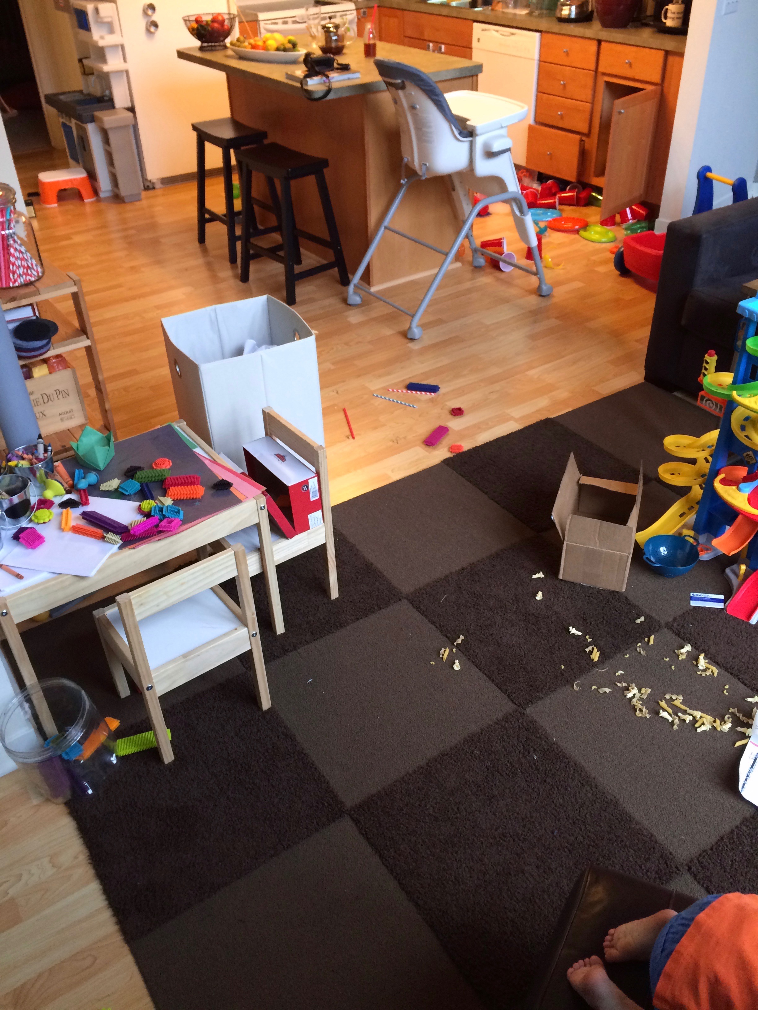 Yes, you're excited that kiddo has learned to climb onto the ottoman. But if you step back you can capture all of the beautiful chaos surrounding that milestone.