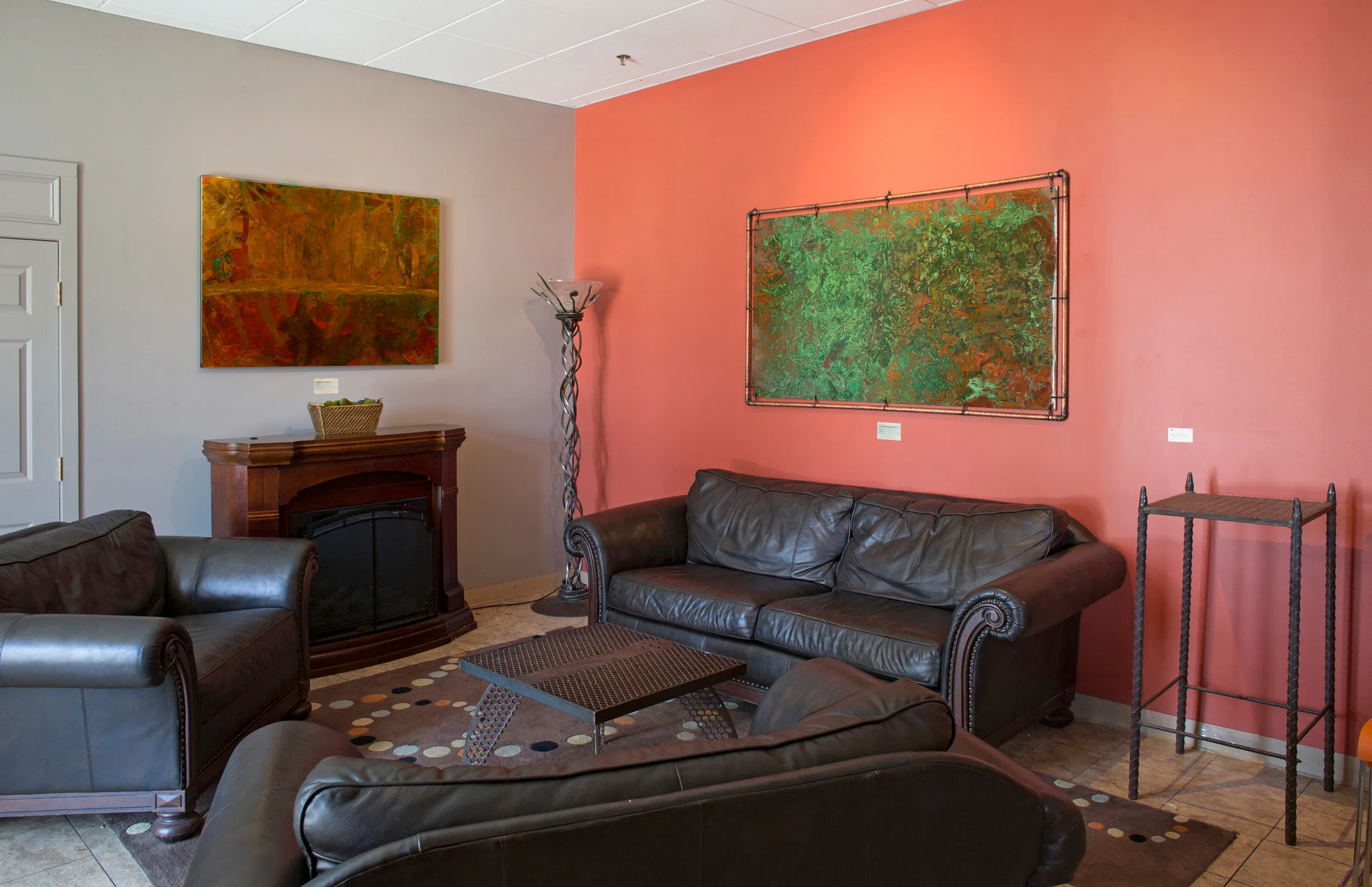 Seating area, Periodic Table Café. The abstraction above the sofa is 6' x 3', and is a reversible piece with images on both sides of the copper.