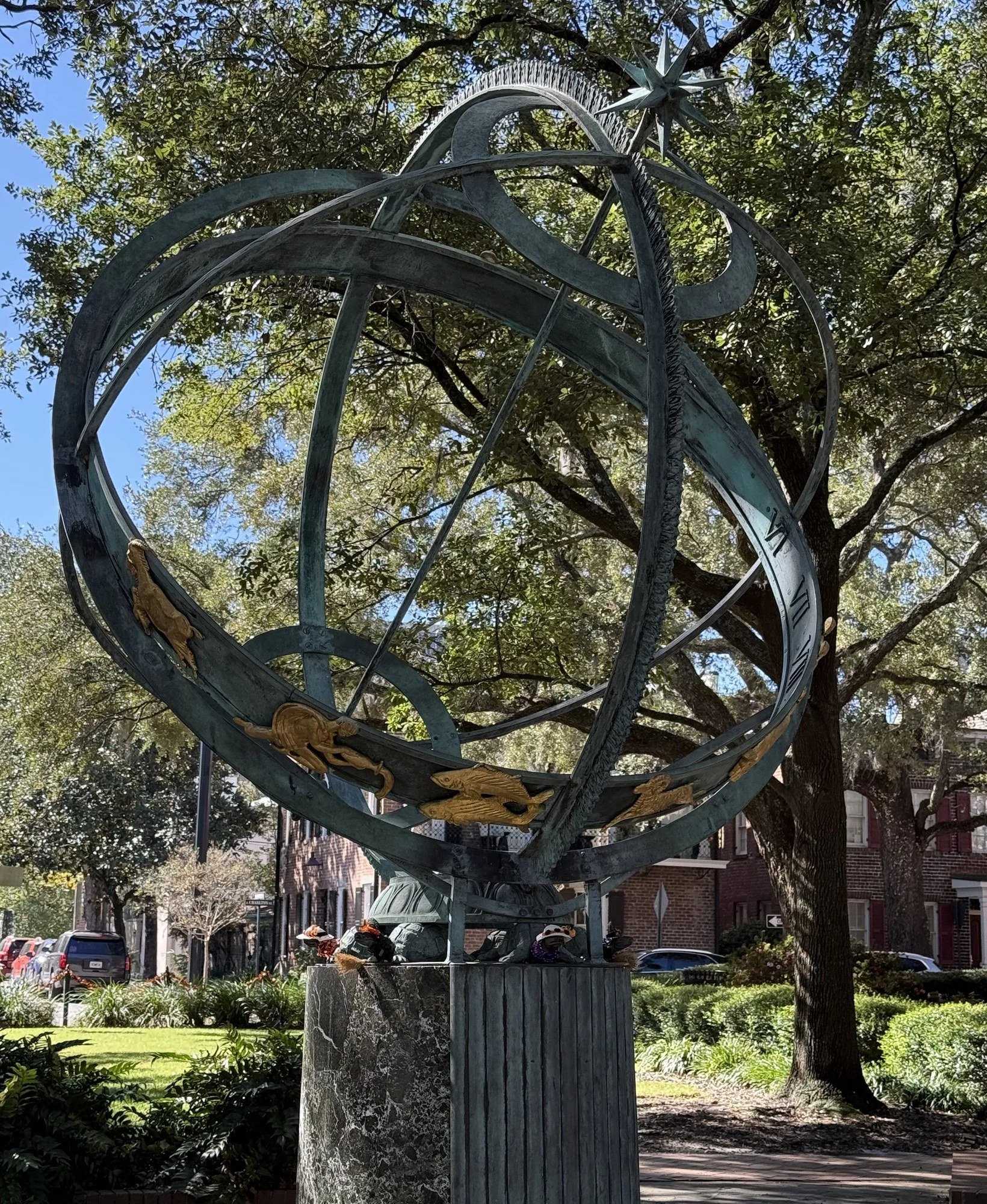 Bronze armillary sphere with gold zodiac figures in Troup Square, Savannah - Weekly Sidereal Horoscopes