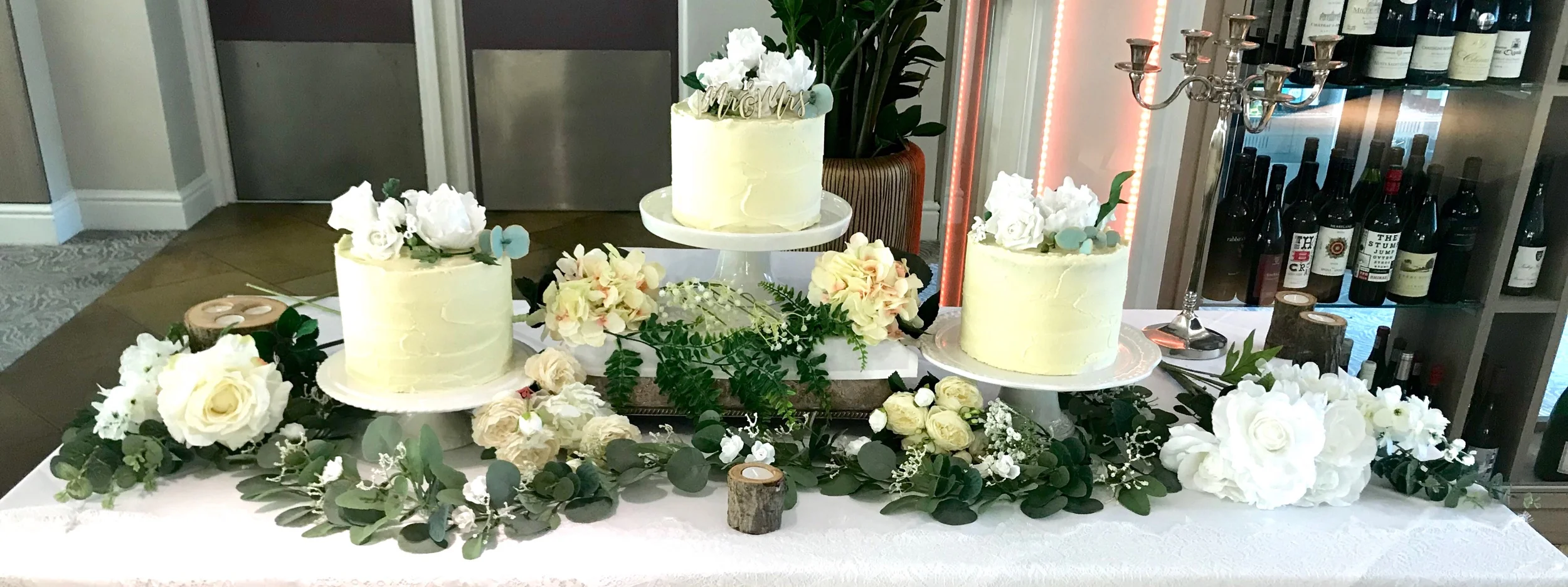 Botanical themed semi naked wedding cake