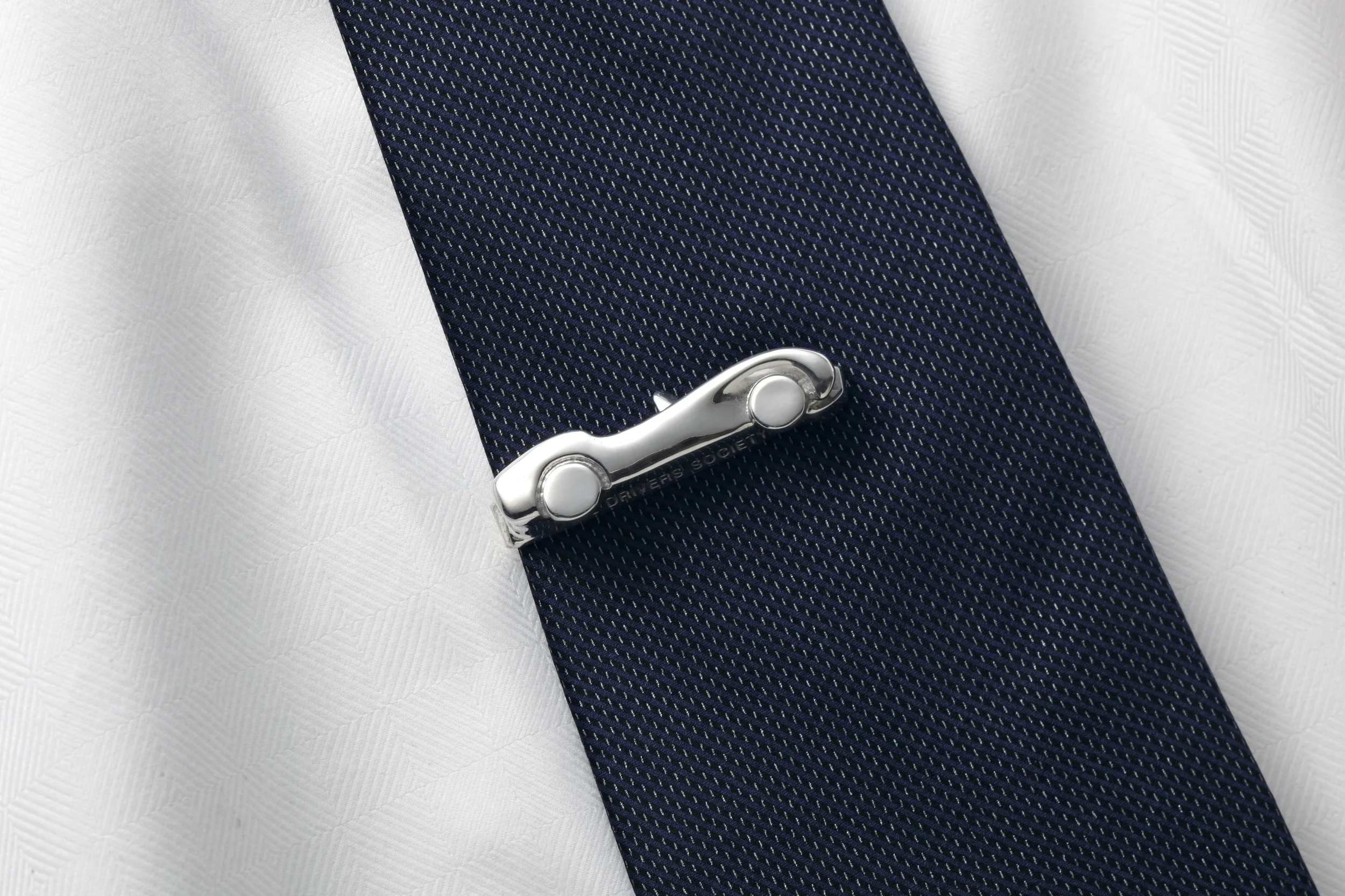Borrani TR tie bar on dark tie