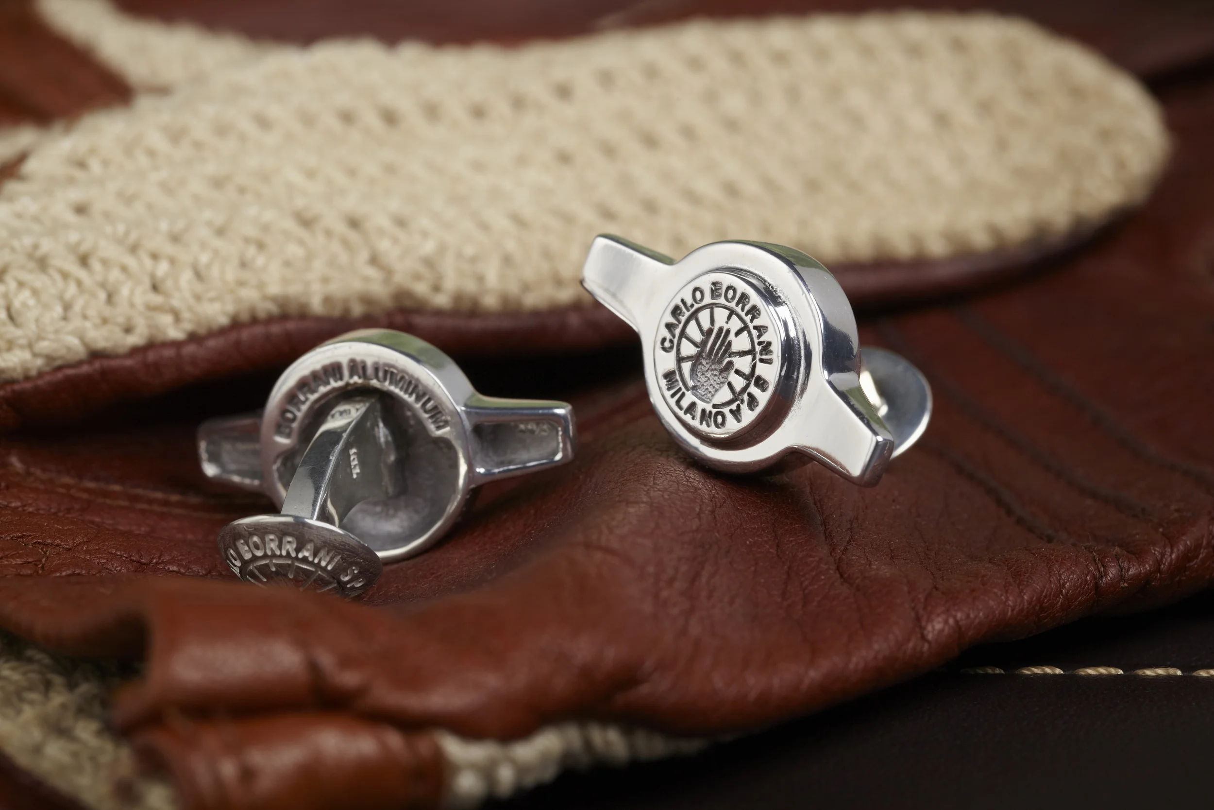 Borrani two ear cufflinks with string back driving gloves