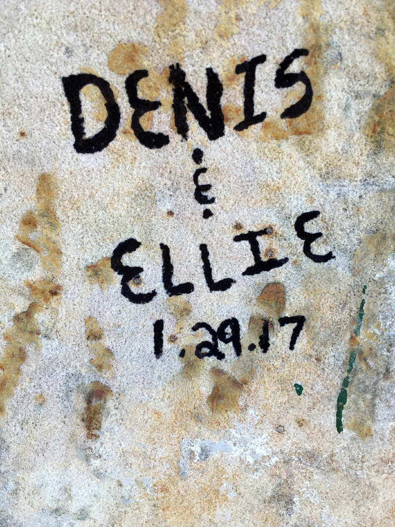 We signed our names on the wall that lines the Graceland property.