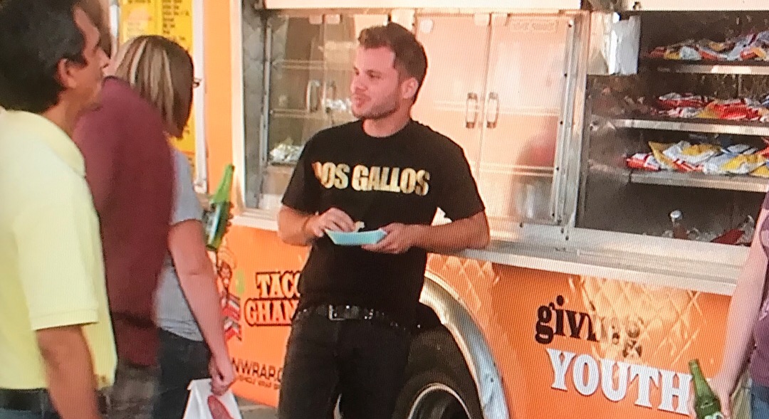 Closeup of Dos Gallos Tee in Taco Shop Movie