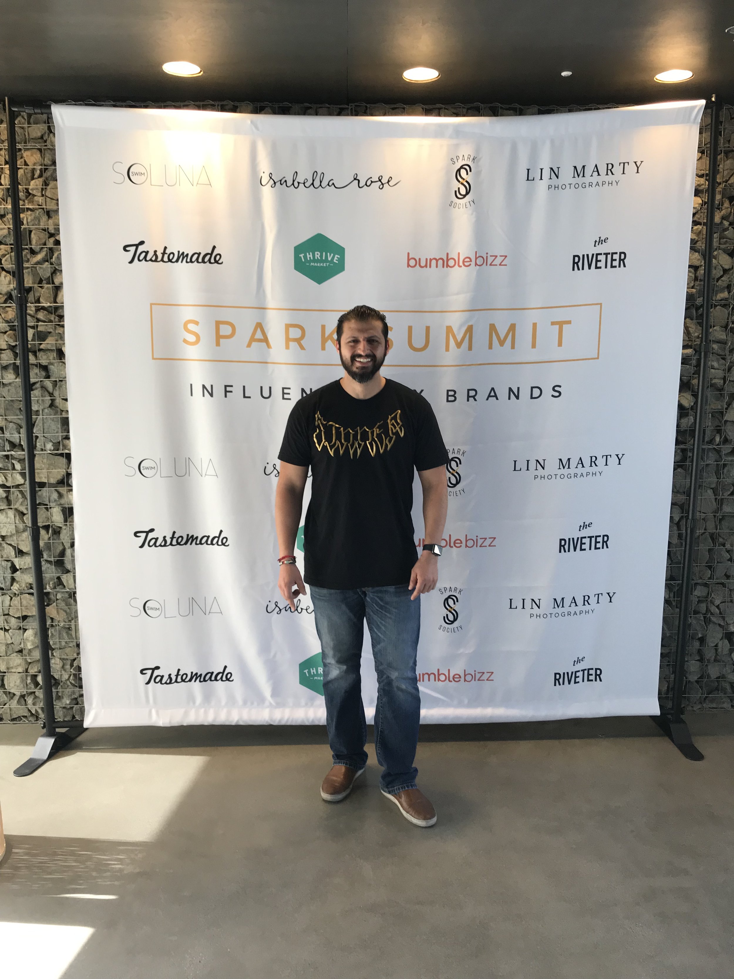 Me at the Spark Summit backdrop