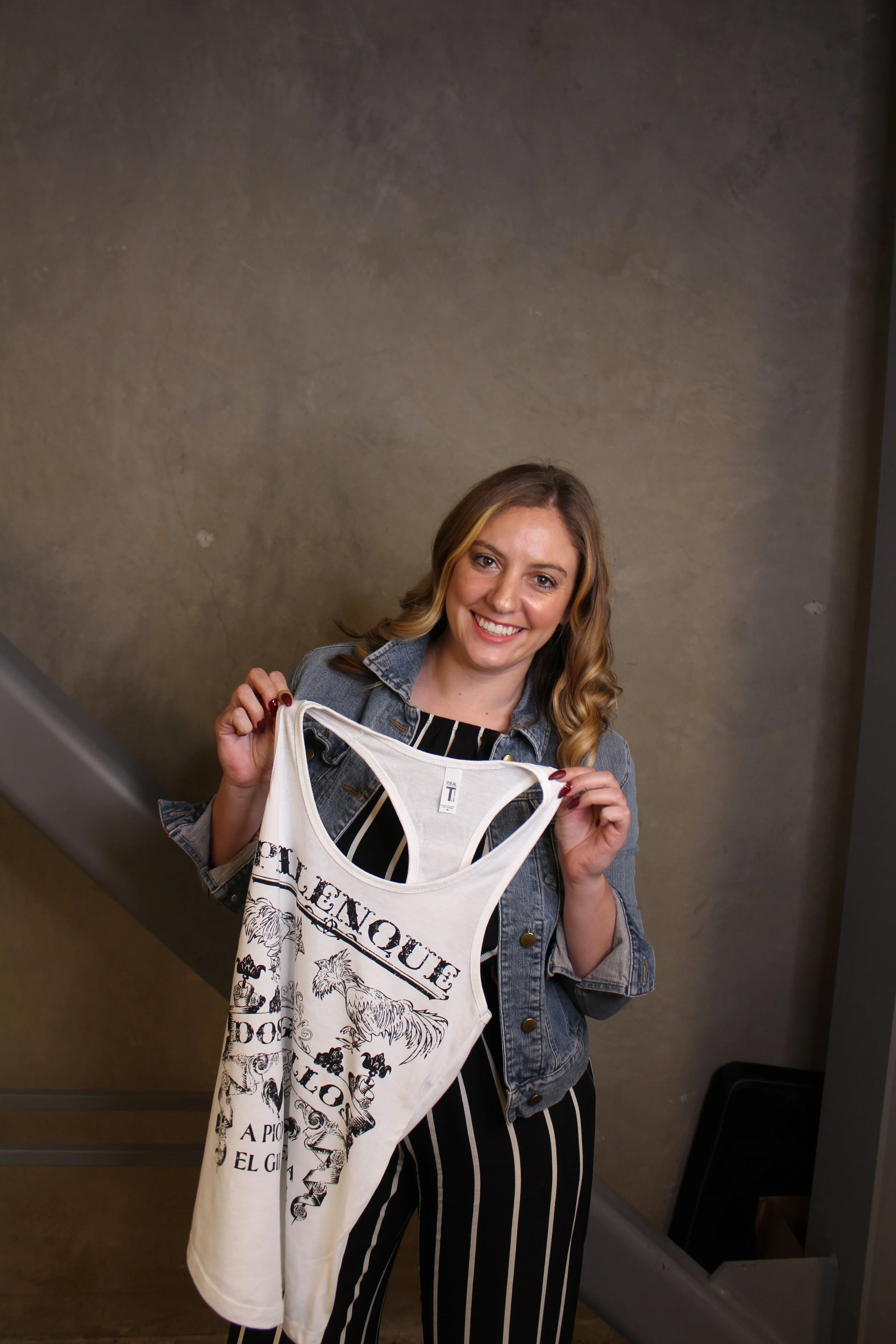 Spark Summit Guest showing off their Palenque Dos Gallos Tank Top