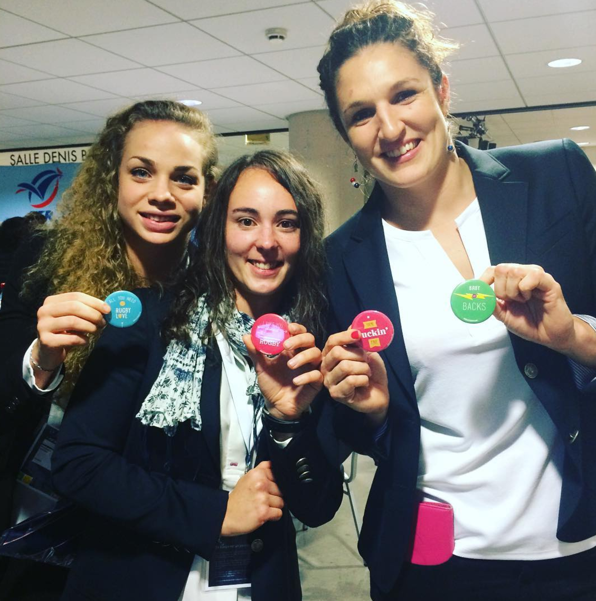 We sent some swag over to France with the USA Women's Eagles for their fall tour. Here's the French scrumhalf, lock, and wing reppin' some buttons.