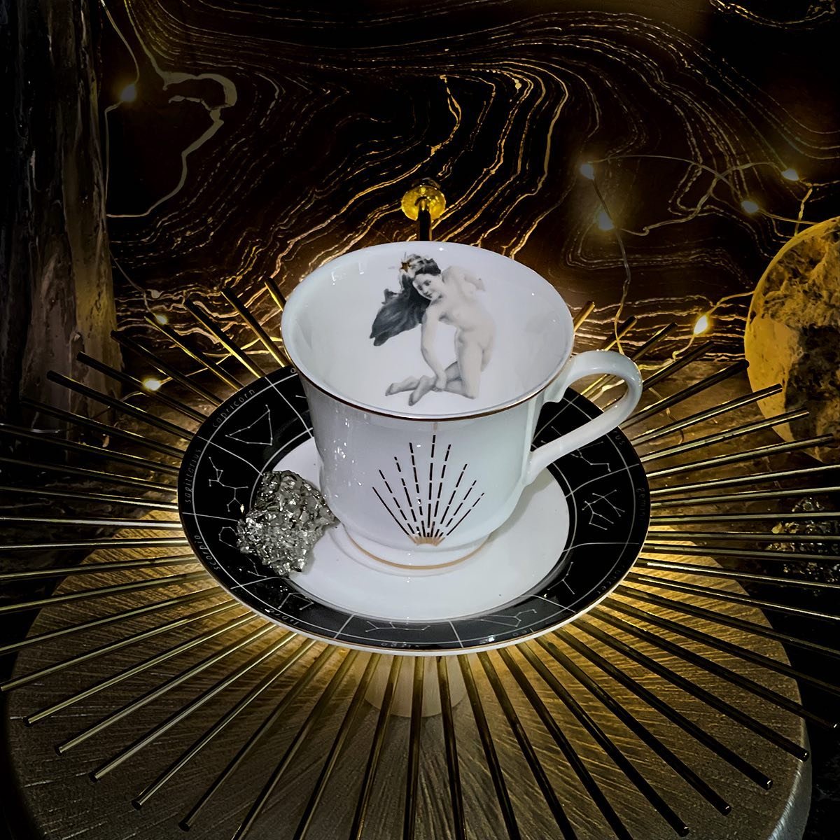 astrological girl teacup.jpeg