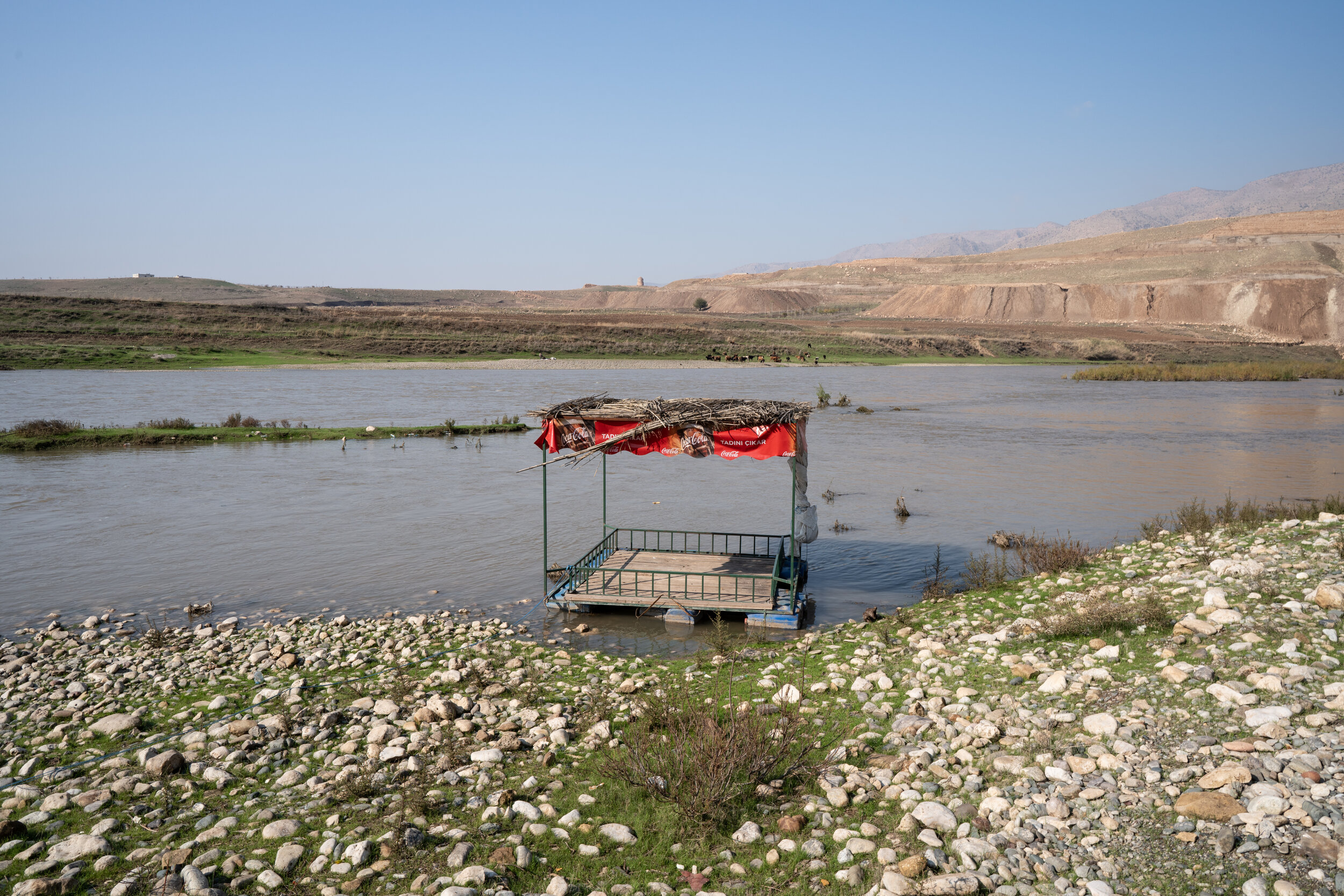 A cardak from one of the Hasankeyf's riverside cafes rests downriver of the city.