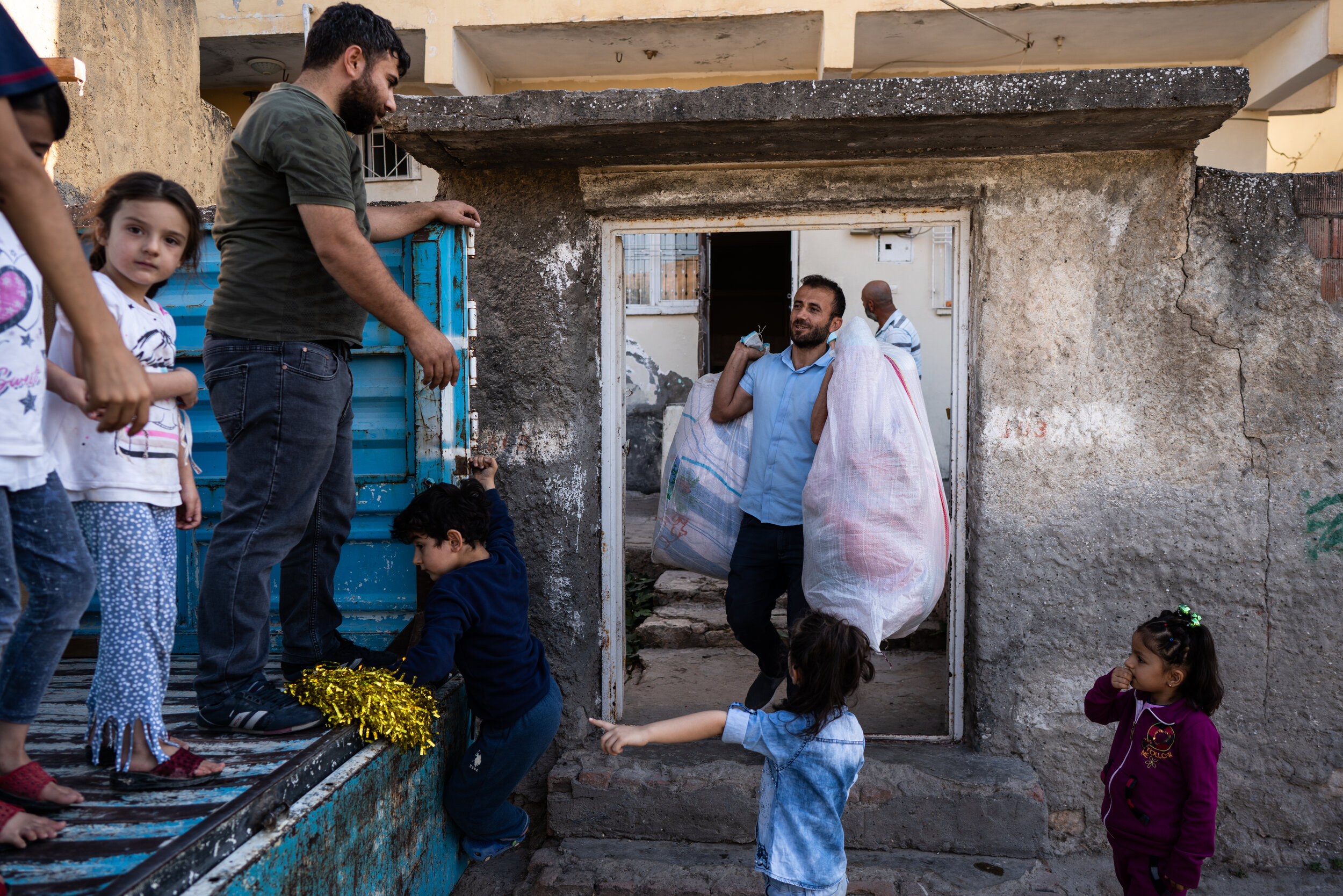 A family moves their possessions from their home in old Hasankeyf